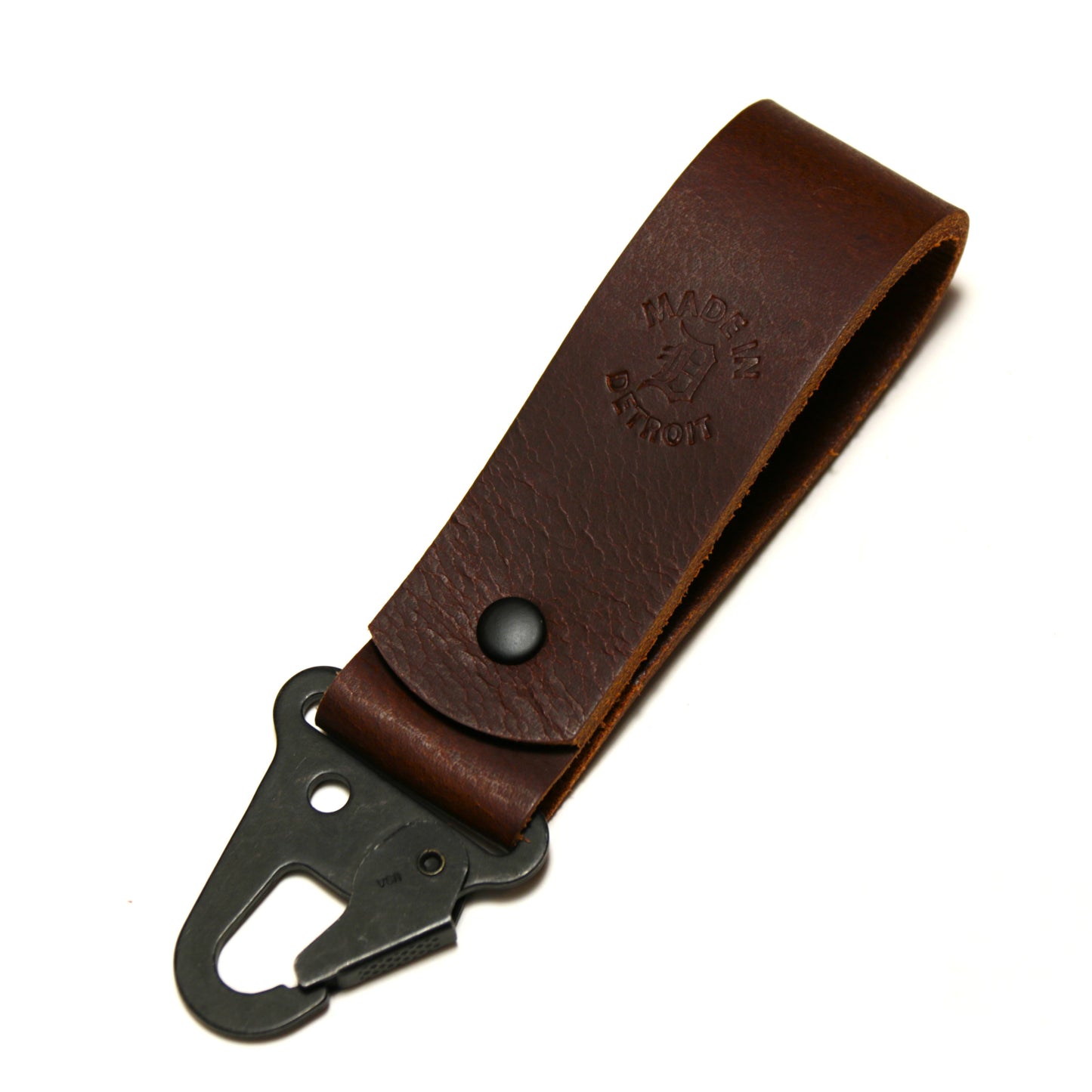 Brown leather strap with black metal HK style clip on a white background